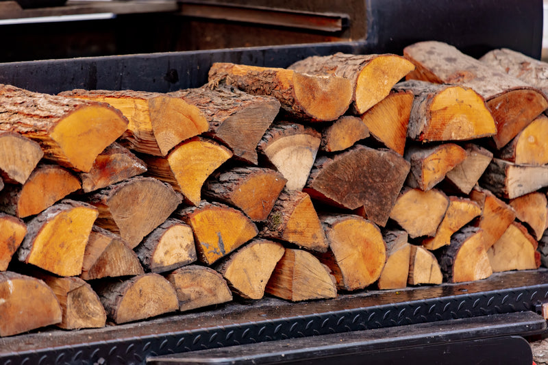 Stacked kiln-dried boiler-grade hardwood