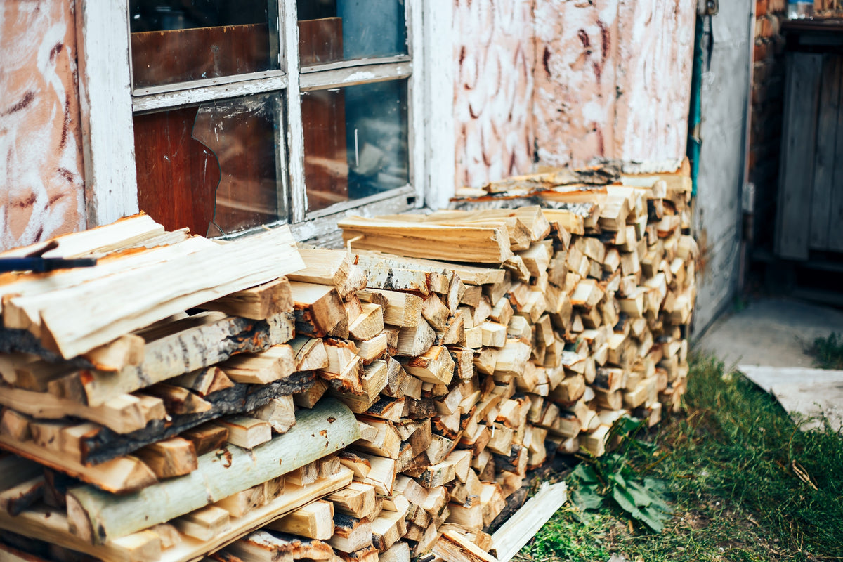 Neatly stacked split firewood — clean and consistent